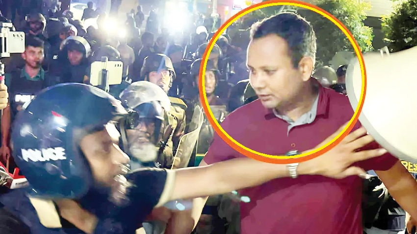 মেরুন রঙের টি-শার্ট পরিহিত সেই ব্যক্তি পল্টন থানার ওসির গাড়িচালক